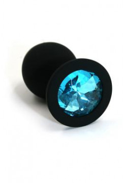 Черная анальная пробка из силикона с нежно-голубым кристаллом Длина: 7 см. Диаметр: 3,5 см.